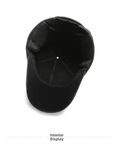Close-up of the thick warm lining and foldable ear flaps on this men's winter hat