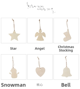 Close-up of wooden DIY Christmas ornaments including star, angel and bell shapes