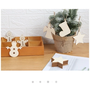 Close-up of wooden Christmas tree ornaments featuring stars and angel shapes