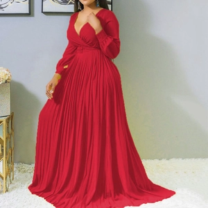 Red plus size pleated maxi dress with deep V-neck, long sleeves and belted waistline