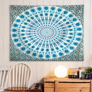Blue and white bohemian mandala tapestry for yoga wall decor in a cozy home setting