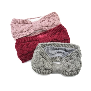Close-up of cable knit texture and warm fleece lining on three assorted winter headbands