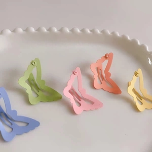 Lot de cinq barrettes papillon mates aux couleurs macaron pour petites filles