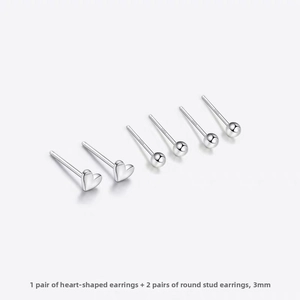 Detailed view of S925 sterling silver set featuring heart studs and 3mm ball earrings
