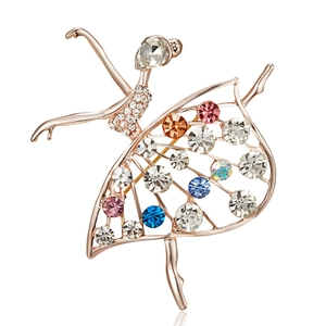 Elegant ballet dancer brooch in rose gold with multi-colored crystals on white background