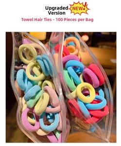 Close-up of 100 colorful elastic macaron-colored towel hair ties in a clear bag