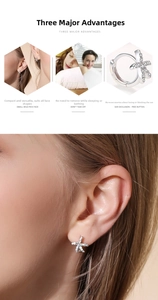 Detail of S925 sterling silver starfish hoop earrings with sparkling micro-pave cubic zirconia