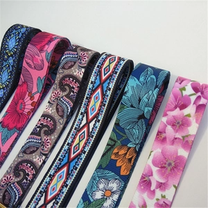 Multiple colorful bohemian floral and geometric patterned wide shoulder straps for bags