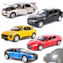 Collection of six alloy vintage model cars with openable doors and realistic details
