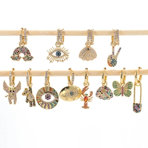 Fashionable gold earrings set with colorful zircon in heart, shell and butterfly shapes