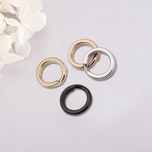 Polished stainless steel flat key rings in gold, silver, rose gold, and black colors