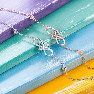Elegant S925 silver infinity heart bracelet with sparkling cubic zirconia in silver and gold