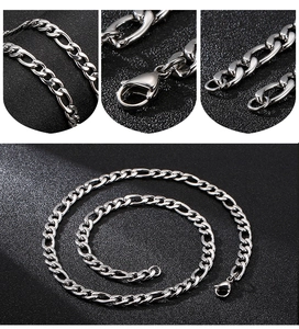 Detailed close-up of silver Figaro chain necklace links and secure lobster clasp on black background
