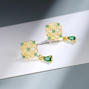 Vintage gold hollowed floral earrings with emerald green teardrop tassels for women
