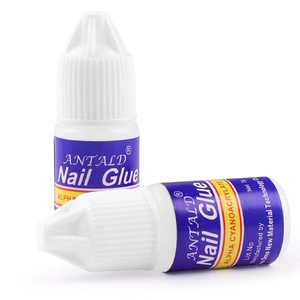 Two bottles of ANTALD professional 3g nail glue for rhinestones and false tips on white