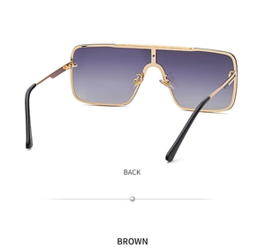 Rear view of gold metal square oversized sunglasses with brown gradient lenses