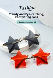 Detail of star-shaped rimless sunglasses in black and red with gold metal temples