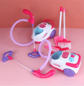 Detailed accessories of the pink and purple kids cleaning set with toy vacuum and broom