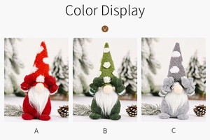 Detailed view of three festive Christmas gnomes in red, green and grey with polka dot hats