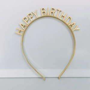 Detail of golden Happy Birthday headband featuring elegant metallic electroplated finish