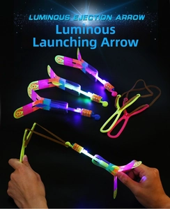 Macro view of LED slingshot arrows with bright wings and colorful glowing lights