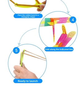 Detail showing the folding steps and rubber band assembly for the LED slingshot toy