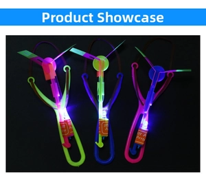 Detailed view of LED slingshot helicopters in green, blue, and pink glowing against dark background