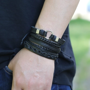 Handmade multilayer black leather bracelet set for men and women featuring woven textures