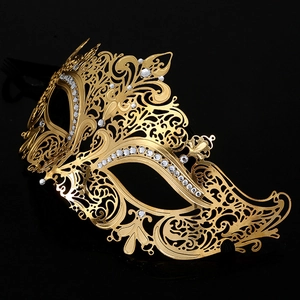 Golden metal masquerade mask for women featuring sparkling white rhinestones on black background