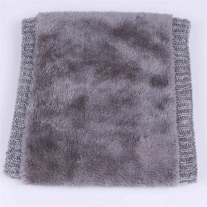 Close-up of thick grey knitted neck warmer featuring soft fleece lining for winter warmth