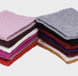 Detail of diverse colors and basket-weave knit texture on winter warm neck warmers