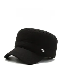 Detail of black winter military cap featuring textured fabric and metal F-Sport emblem