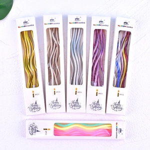 Detailed set of twisted metallic birthday candles in gold, silver and rainbow colors