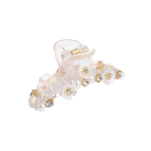 Elegant clear hair claw clip with white flowers, pearls and rhinestones on white background