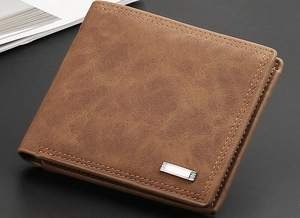 Detailed 45-degree view of a brown men's bifold leather wallet with vintage texture