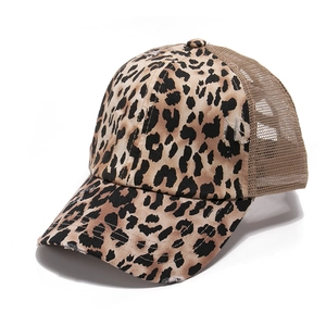 Distressed leopard print trucker hat with mesh back and vintage frayed details