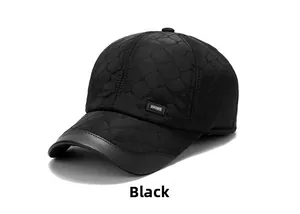Detail of black quilted baseball cap with SPORT label and leather trimmed brim