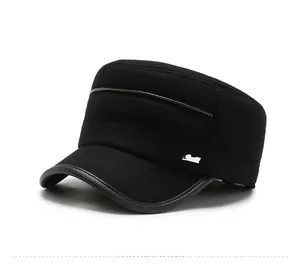 Detail view of winter black flat top military cap with leather trim and metal buckle