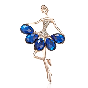 Elegant gold ballerina brooch featuring deep blue pear-cut crystals and sparkling rhinestones