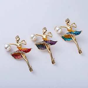 Detailed view of ballet girl brooches with colorful enamel, pearls and rhinestones