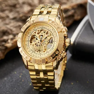 Close-up of golden automatic mechanical watch with skeleton dial and textured bezel