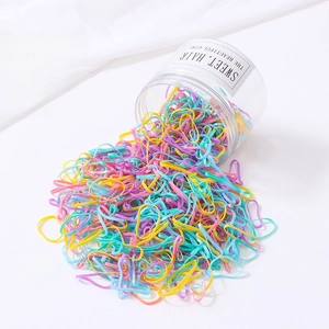Détail de 1000 élastiques à cheveux couleurs macaron en pot pour enfants et filles