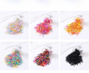 Lot détaillé de 1000 élastiques à cheveux jetables en six thèmes de couleurs variés