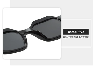 Vue détaillée des plaquettes de nez intégrées légères sur lunettes de soleil géométriques