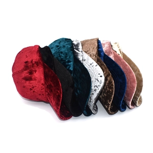 Multiple colors of velvet baseball caps showing plush texture for autumn and winter fashion