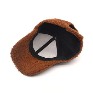 Brown faux fur lamb wool baseball cap for winter featuring warm soft fleece and inner lining