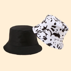 Minimalist black and white panda pattern cotton bucket hat for sun protection and fashion