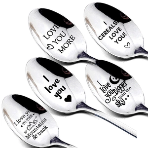 Set of 5 stainless steel spoons engraved with romantic quotes on white background