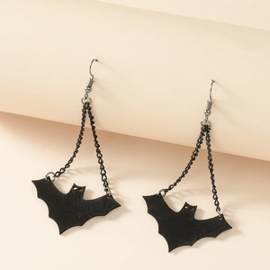 Detail of gothic black bat earrings featuring delicate chains and metal hooks for Halloween