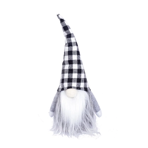 Close-up of a Nordic Christmas gnome with a black and white plaid hat and long white beard